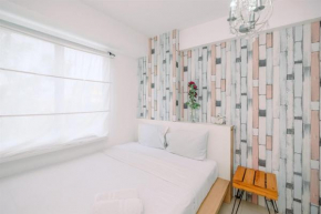 Warm and Cozy 2BR at Low Floor Bassura City Apartment By Travelio